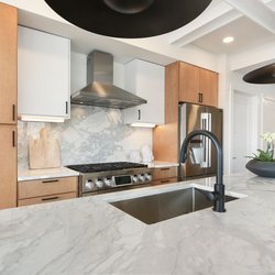 Armina Stone - Calacatta Carrara marble countertops by Armina Stone at Lawrenceville Lofts in Pittsburgh.