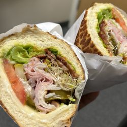Della-Rose Deli - Cali club on Dutch crunch with the works + jalapeños + sprouts. Best combo in my opinion!!