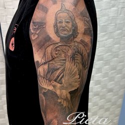 Pieta Tattoo Gallery