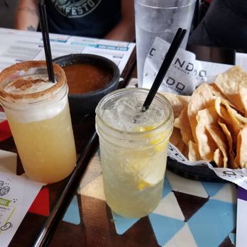 Condado Tacos - Pineapple margarita and lemon margarita with chips and salsa - Bars Near Me - Detroit, Michigan