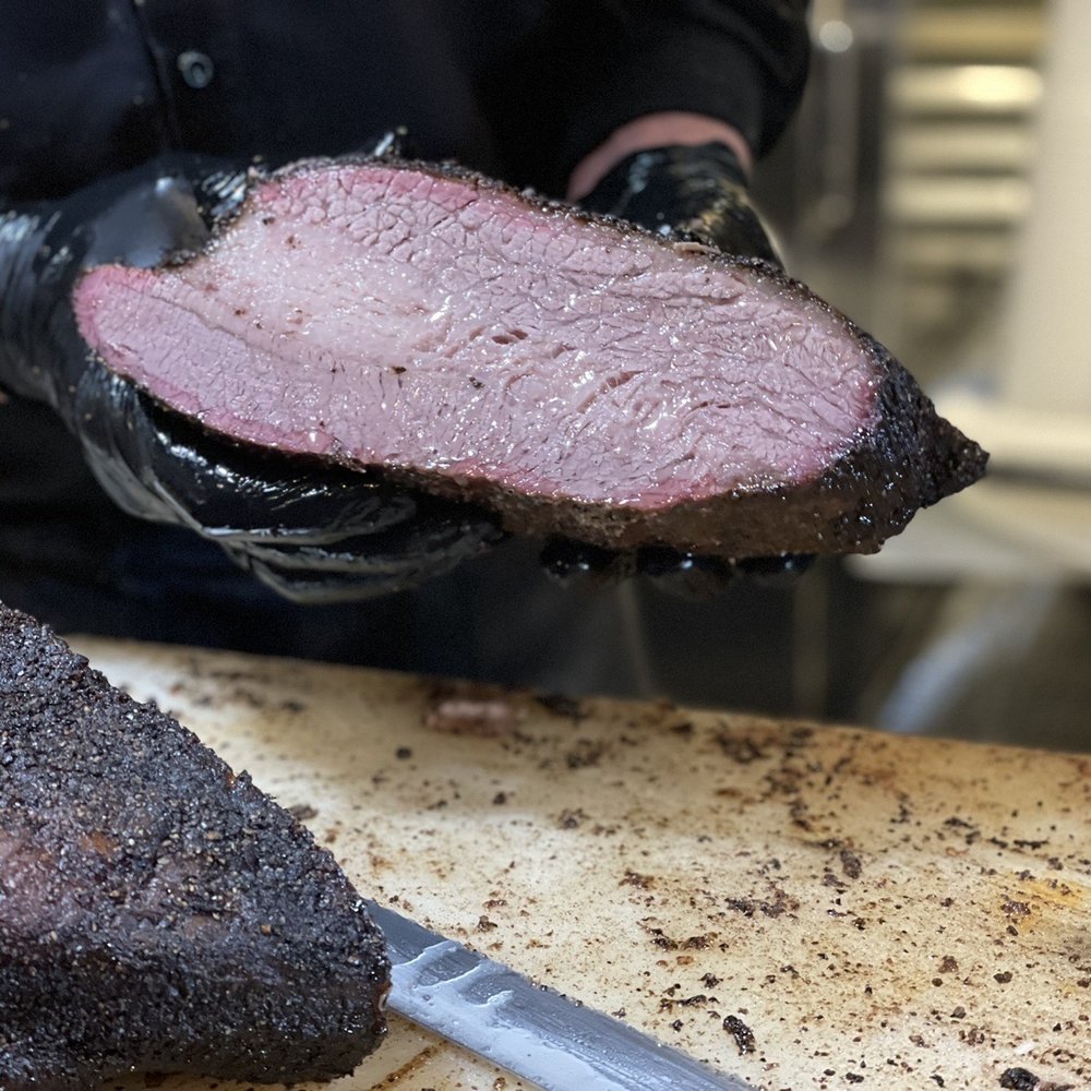 Mad Jack's Mountaintop Barbecue - A brisket they sliced in half while I was ordering. Juice just flowed from it and there is a perfect (lightly tangy) bark - Barbeque Near Me - Cloudcroft, New Mexico Mad Jack's Mountaintop Barbecue - A brisket they sliced in half while I was ordering. Juice just flowed from it and there is a perfect (lightly tangy) bark - Barbeque Near Me - Cloudcroft, New Mexico