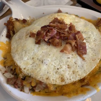 Broken Yolk Cafe - Hash Skillet with egg over medium - Breakfast & Brunch Near Me - Costa Mesa, California