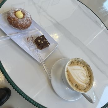 Cafe 44 - Pistachio latte, vegan chocolate dessert, custard filled donut - Cafes Near Me - Morton Grove, Illinois