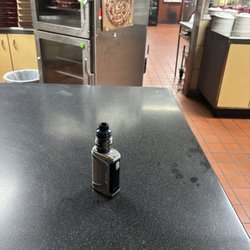 Pizza Hut - Employee's vape on the counter where I pick up my orders