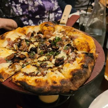 SLYCE Coal Fired Pizza Company - White sauce, fig, and balsamic. Clearly burned and worse on the bottom - Pizza Near Me - Wauconda, Illinois SLYCE Coal Fired Pizza Company - White sauce, fig, and balsamic. Clearly burned and worse on the bottom - Pizza Near Me - Wauconda, Illinois