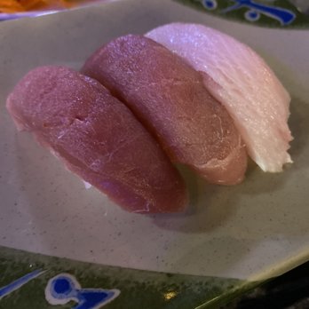 Sushi Nini - (Left two) blue fin, (right side) tuna - Sushi Bars Near Me - Round Rock, Texas Sushi Nini - (Left two) blue fin, (right side) tuna - Sushi Bars Near Me - Round Rock, Texas