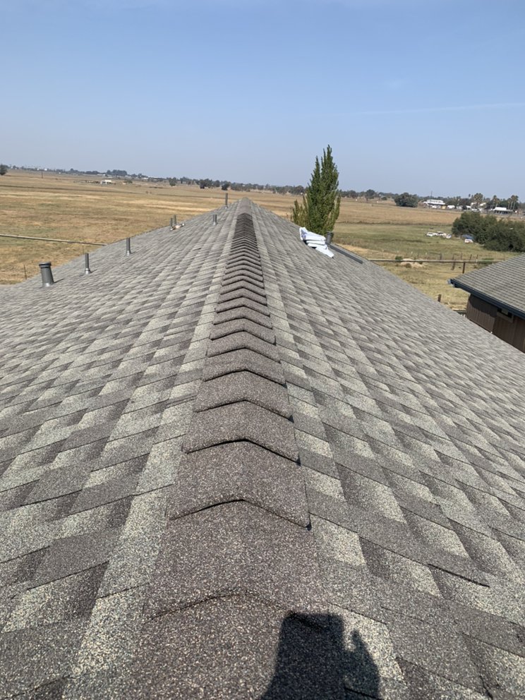 Slide of Ortiz Roofing