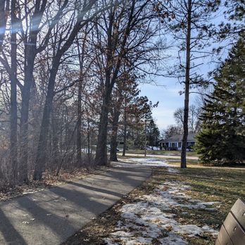 Kordiak Park - Sample view from a bench of an asphalt pathway that goes partially around the lake. - Parks Near Me - Columbia Heights, Minnesota Kordiak Park - Sample view from a bench of an asphalt pathway that goes partially around the lake. - Parks Near Me - Columbia Heights, Minnesota