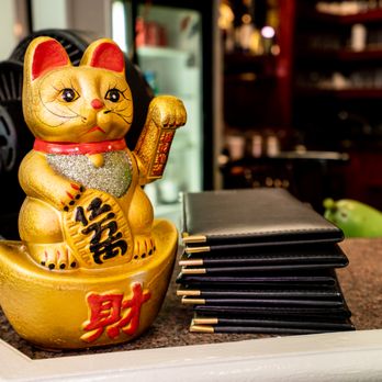 Hoa Vien Quán - a cat statue on a counter - Vietnamese Near Me - Falls Church, Virginia Hoa Vien Quán - a cat statue on a counter - Vietnamese Near Me - Falls Church, Virginia