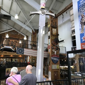Smoky Mountain Knife Works - Big Sword in the Stone Display - Outdoor Gear Near Me - Sevierville, Tennessee Smoky Mountain Knife Works - Big Sword in the Stone Display - Outdoor Gear Near Me - Sevierville, Tennessee