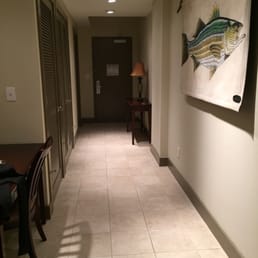 Foyer with a 1/2 bath on the left.