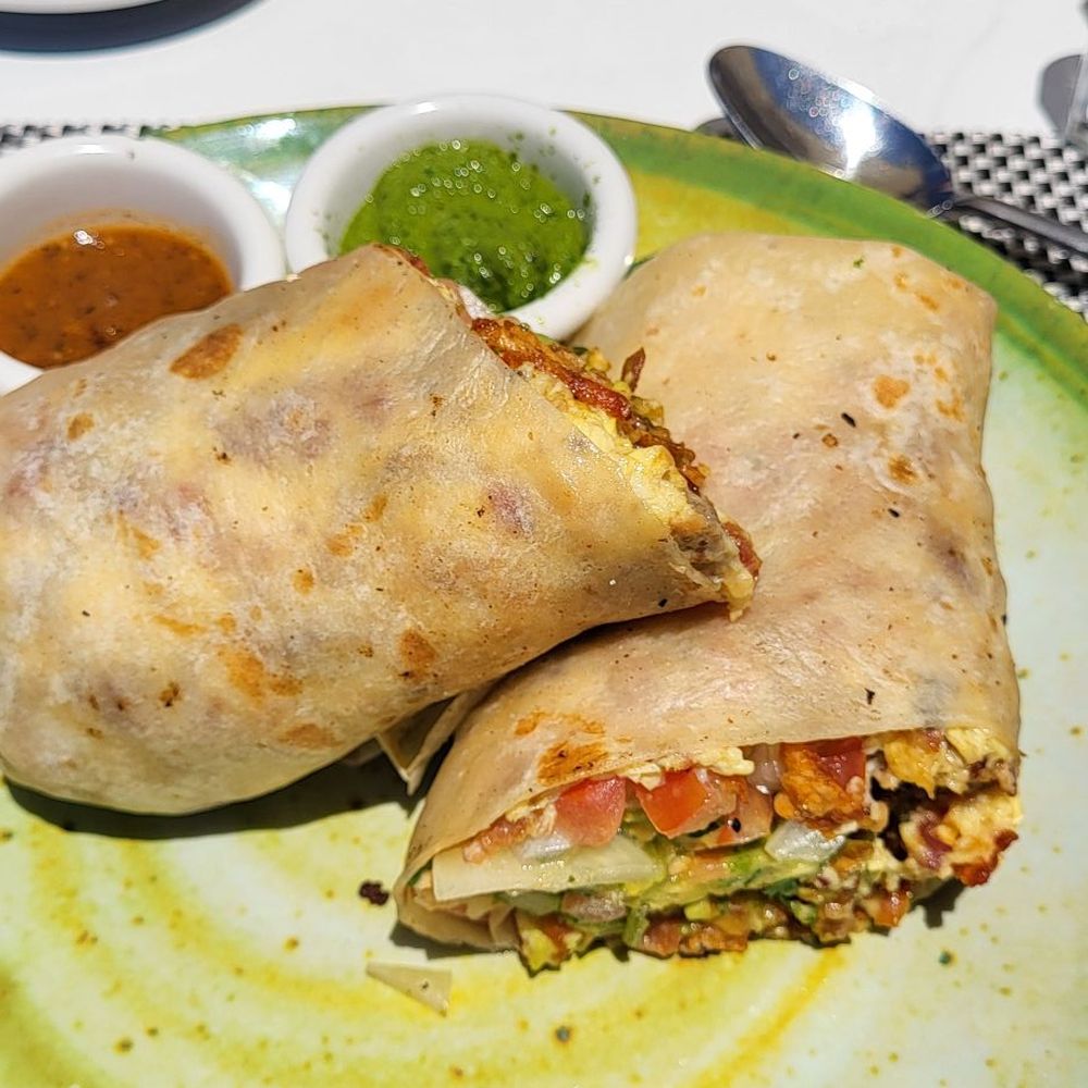 Excellent breakfast burrito, but those red and green salsas absolutely stole the show. Worth asking for extra! Excellent breakfast burrito, but those red and green salsas absolutely stole the show. Worth asking for extra!