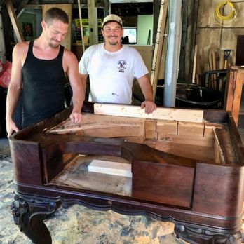 Independence Contracting - two men working on a coffee table - General Contractors Near Me Independence Contracting - two men working on a coffee table - General Contractors Near Me