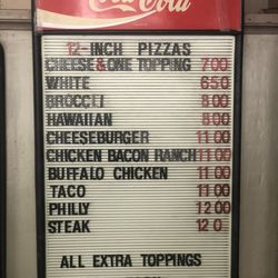 Mile Level Pizza & Sub Shop - Specialty pizza board (12" medium rounds)
