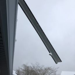 One of the snow rails that was incorrectly installed-you can see it was only screwed to the roof on the bottom instead of both bottom & top.