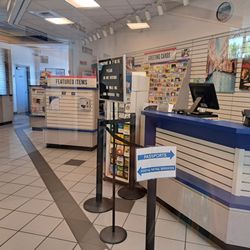 US Post Office - Passports counter is the first one on your right.