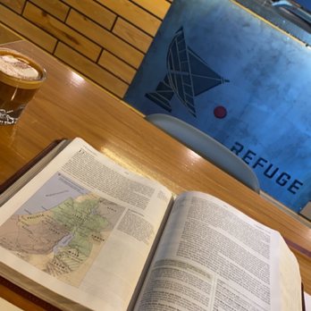 Refuge Coffee - an open book and a glass of beer - Coffee & Tea Near Me - Fairhope, Alabama Refuge Coffee - an open book and a glass of beer - Coffee & Tea Near Me - Fairhope, Alabama
