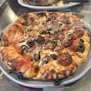 Lorenzo's Italian Restaurant - Pizza with Prosciutto, black olives and pepperoni - Italian Near Me - Las Cruces, New Mexico