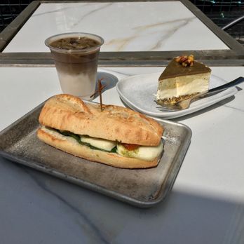 Tru Cafe - Caprese sandwich, pistachio cheesecake, iced hojicha latte - Ice Cream & Frozen Yogurt Near Me - Vancouver, British Columbia Tru Cafe - Caprese sandwich, pistachio cheesecake, iced hojicha latte - Ice Cream & Frozen Yogurt Near Me - Vancouver, British Columbia