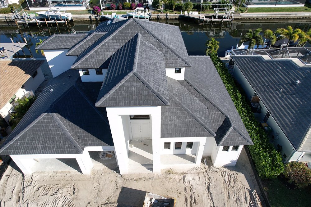 Slide of Mighty Fine Roofing