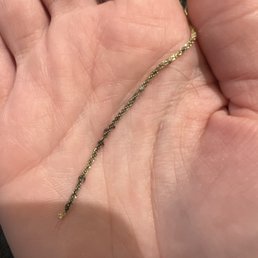 The anklet-broke less than 48 hours after wearing with minimal movement, picking up fuzz and hair from where ever the hell it came from. The anklet-broke less than 48 hours after wearing with minimal movement, picking up fuzz and hair from where ever the hell it came from.