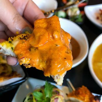 Saffron - Garlic naan with Hyderabadi Chicken Curry - Indian Near Me - San Carlos, California Saffron - Garlic naan with Hyderabadi Chicken Curry - Indian Near Me - San Carlos, California