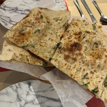 Momos & Grill - Garlic naan - Indian Near Me - Mountain Home, Arkansas