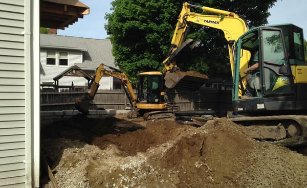 McGue Excavating Logo