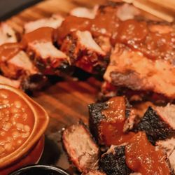 Smokehouse Barbecue - Kansas City, MO - Zona Rosa - Pork spare ribs, 1/4 bone-in chicken & one sliced meat, with three large sides, Texas toast and pickles.