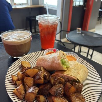 TheSpot Cafe - Chicken Cesar wrap with garlic parm croutons and delicious homemade home fries, Homemade Ice green raspberry tea with a cup of coffee - Breakfast & Brunch Near Me - East Hartford, Connecticut TheSpot Cafe - Chicken Cesar wrap with garlic parm croutons and delicious homemade home fries, Homemade Ice green raspberry tea with a cup of coffee - Breakfast & Brunch Near Me - East Hartford, Connecticut