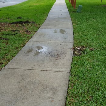 Sprinkler Pro - After picture of sidewalk fix by Sprinkler Pro. - Irrigation Near Me - Hollywood, Florida Sprinkler Pro - After picture of sidewalk fix by Sprinkler Pro. - Irrigation Near Me - Hollywood, Florida