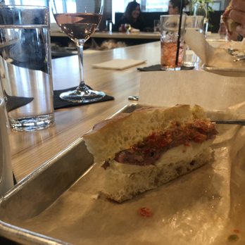Casetta Kitchen and Counter - Bottle of white? Bottle of red? Glass of rose and a sandwich instead. Full disclosure: This was not my sandwich. - Italian Near Me - Madison, Wisconsin Casetta Kitchen and Counter - Bottle of white? Bottle of red? Glass of rose and a sandwich instead. Full disclosure: This was not my sandwich. - Italian Near Me - Madison, Wisconsin