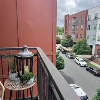 The Village at Commonwealth - Take in the weather on a balcony - Apartments Near Me - Charlotte, North Carolina The Village at Commonwealth - Take in the weather on a balcony - Apartments Near Me - Charlotte, North Carolina
