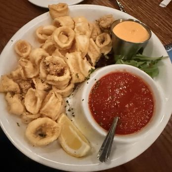 Napoli 3 - Calamari with a side siracha aioli and tomato base sauce. Could have been seasoned a bit more but still good, it's a matter of preference. - Wine Bars Near Me - St Charles, Missouri