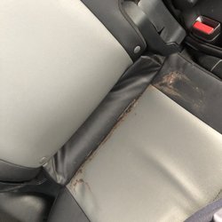 Hertz Rent A Car - The car came like this. Some unknown stuff on the seat