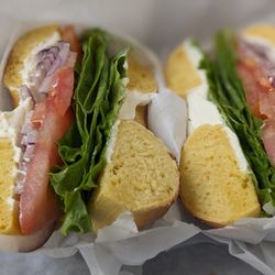 Sunrise Bagels Cafe - Toasted Egg bagel with cream cheese, tomato, red onions and lettuce