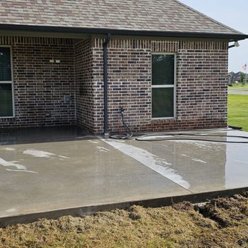 Crazy Bull Services - a concrete patio being poured - General Contractors Near Me