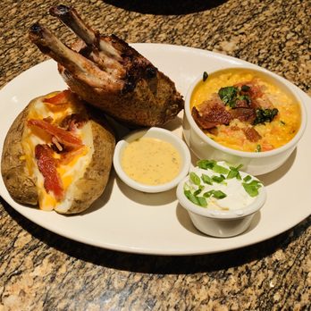 BJ's Restaurant & Brewhouse - Doubled bone in pork chop Creamy Couscous Mac & Cheese and Loaded Baked potato - Pizza Near Me - Tucson, Arizona BJ's Restaurant & Brewhouse - Doubled bone in pork chop Creamy Couscous Mac & Cheese and Loaded Baked potato - Pizza Near Me - Tucson, Arizona