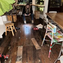 Side Track Coffee - My wife shining her iPhone light in the floor so the guy crawling under there could find it!!