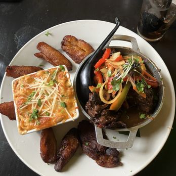 Jerk At Nite - Oxtail with plantains and Jmac n cheese - Caribbean Near Me - Baltimore, Maryland Jerk At Nite - Oxtail with plantains and Jmac n cheese - Caribbean Near Me - Baltimore, Maryland