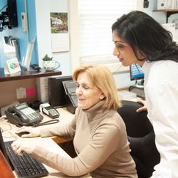 Hampton Dentist - Smiles By The Sea Family Dentistry - Dr. Shevchenko and Sue (Hygienist) working at the front