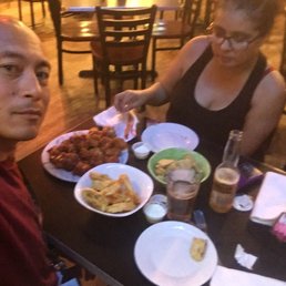 Wings and onion rings, fried pickles and fried jalapeños. Wings and onion rings, fried pickles and fried jalapeños.