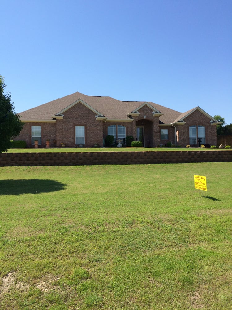 Slide of Tomahawk Roofing Company