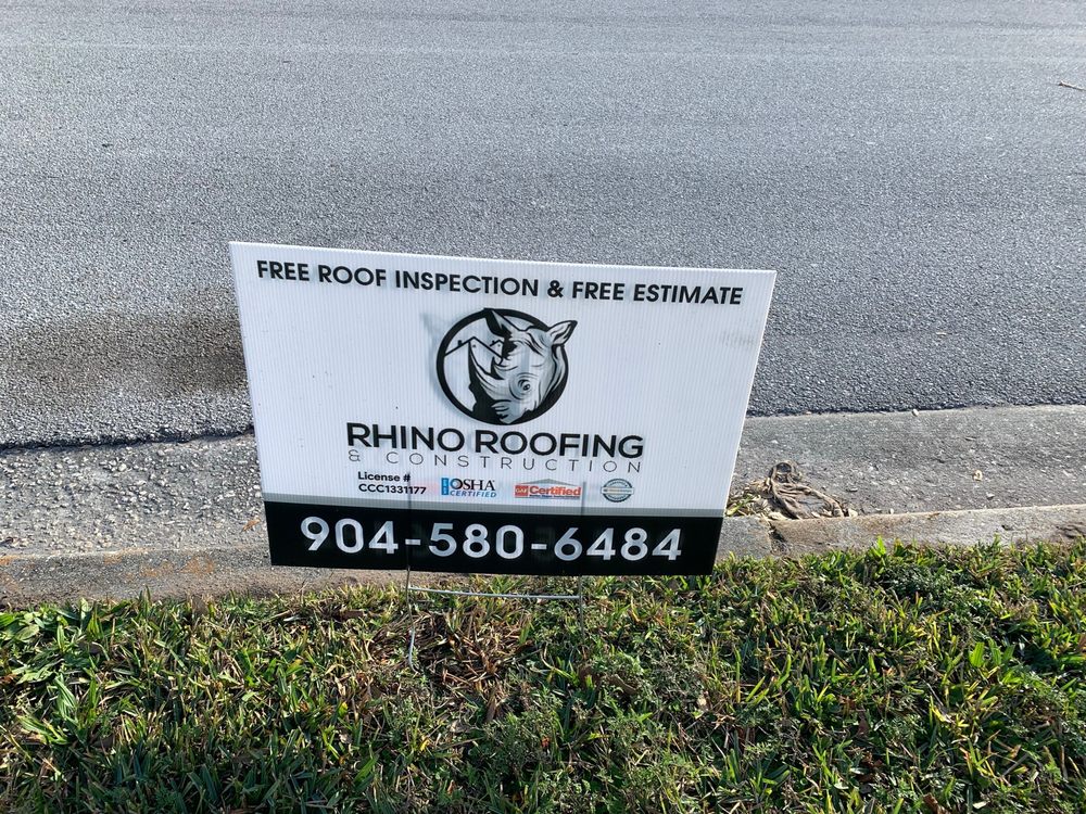 Slide of Rhino Roofing and Construction