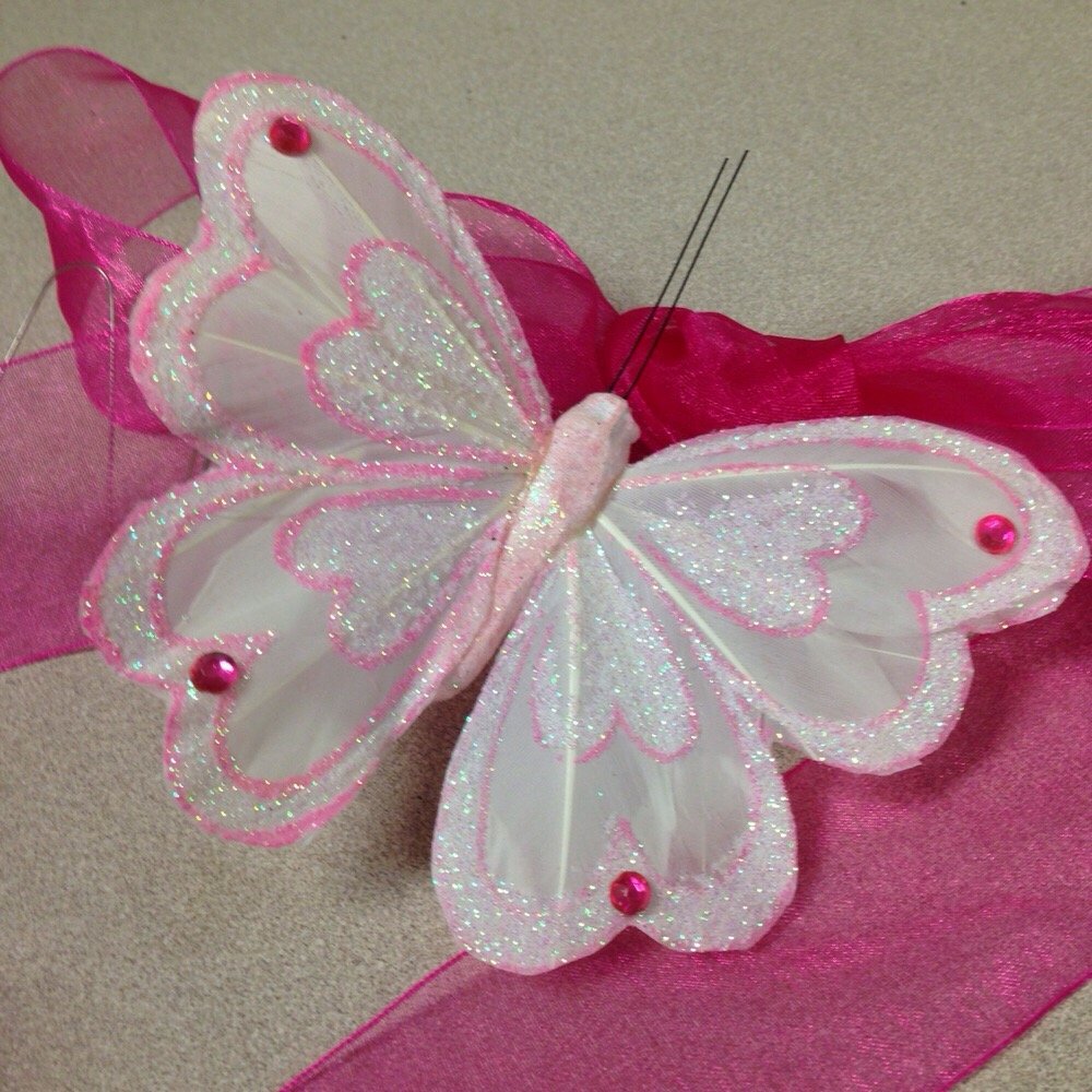 Mason's Florist - Cheap, cheesy butterfly they added even though nothing like this was pictured! - Florists Near Me - Memphis, Tennessee Mason's Florist - Cheap, cheesy butterfly they added even though nothing like this was pictured! - Florists Near Me - Memphis, Tennessee