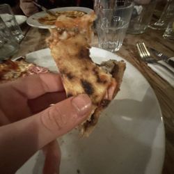 Bellaggio Pizzeria - Sexy bite of pizza