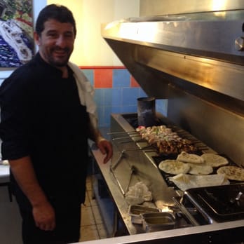 Kebab Kitchen - Hard at work on the charcoal grill. - Turkish Near Me - Halifax, Nova Scotia
