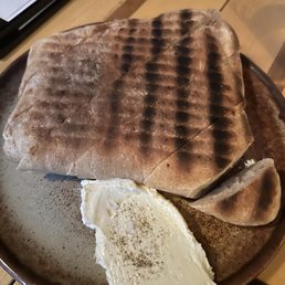 Bread: was dense and grilled. Simple and delicious. We had to order seconds. 5 stars