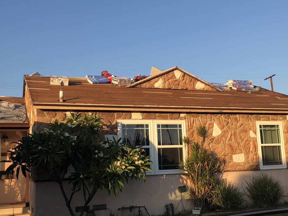 Slide of Arias Roofing Corp