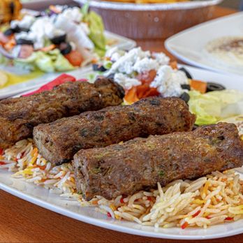 Halal Bites - Chicken Seekh Kabab over Rice - Mediterranean Near Me - Rochester, New York Halal Bites - Chicken Seekh Kabab over Rice - Mediterranean Near Me - Rochester, New York